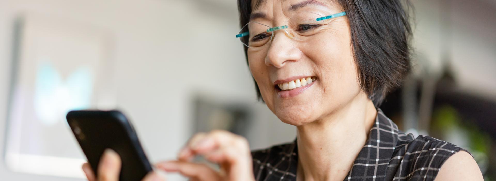Women using EyecareLive app for a virtual eye care appointment